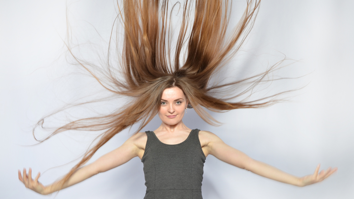 woman with hair sticking straight up
