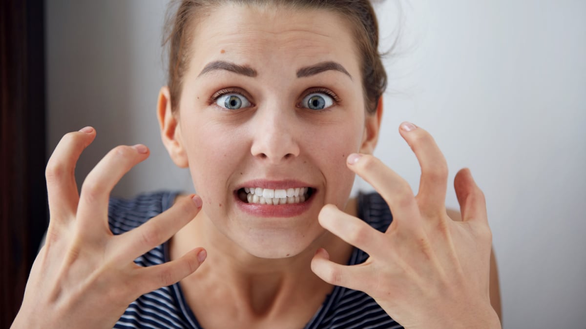 Portrait young angry woman unhappy, annoyed by something Human face expression emotion reaction.