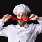 Funny Chef Posing With Food Having Fun Over Black Background