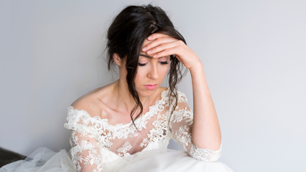 Sad and Worried Bride in her Wedding Day.