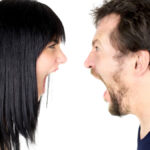 Crazy angry couple fighting hard.