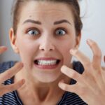 Portrait young angry woman unhappy, annoyed by something Human face expression emotion reaction.