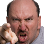 A middle aged man very upset about something. Pointing his finger. Anger Management?
